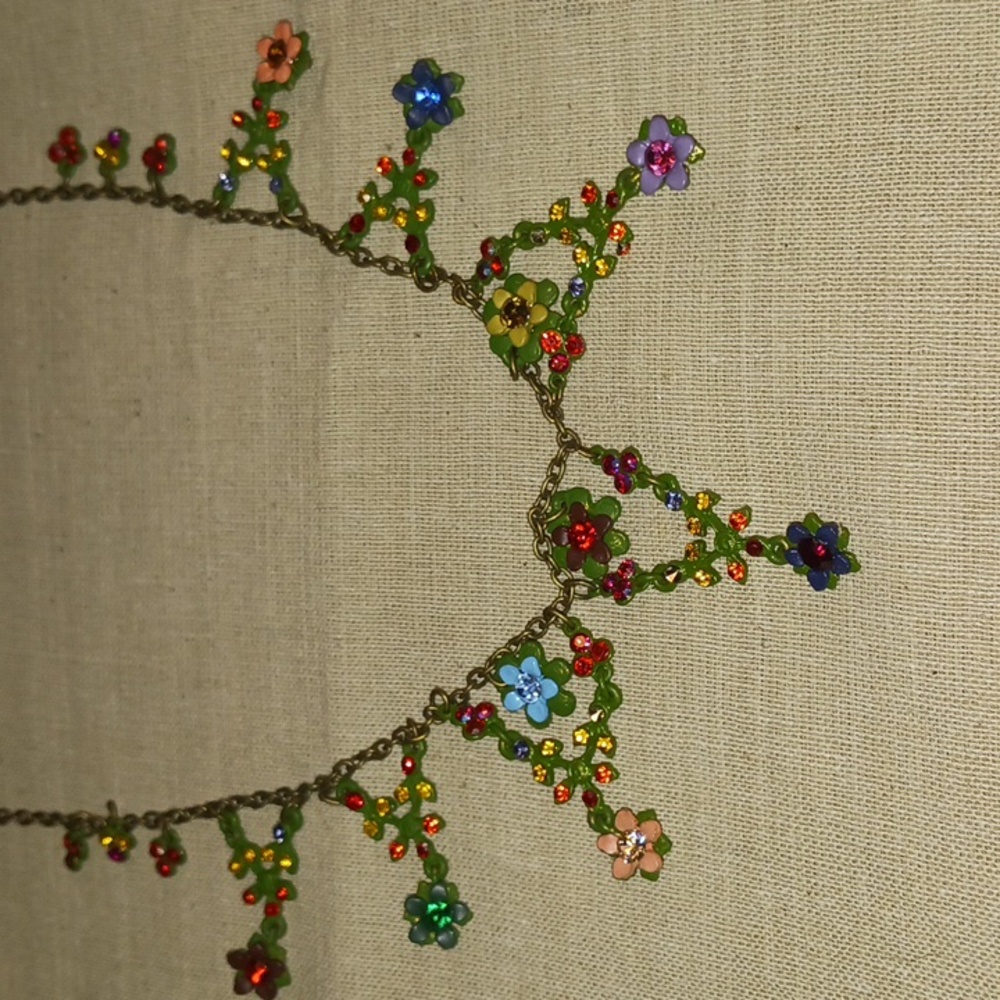 This is a Vintage necklace with genuine crystal